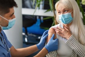 Mature Woman Getting Vaccinated Against Covid-19