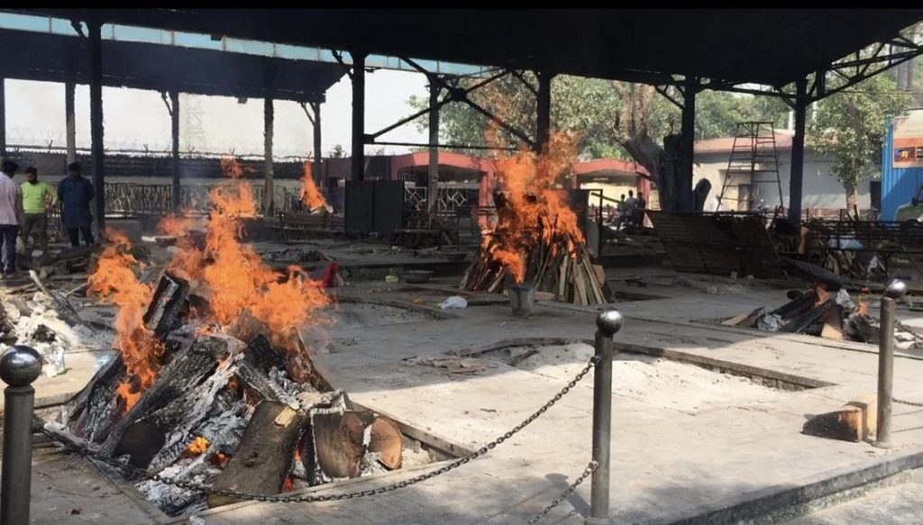 Funeral pyres at the Nigambodh Ghat in New Delhi