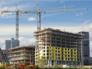 High rise building construction in urban area.