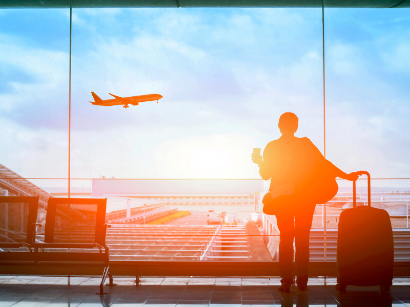 Traveller waiting for flight in airport