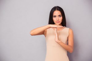 stockfresh_6096905_beautiful-woman-showing-time-out-sign_sizeM-300x200