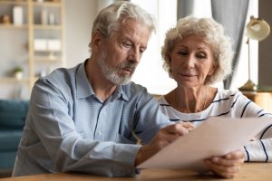 couple read insurance terms