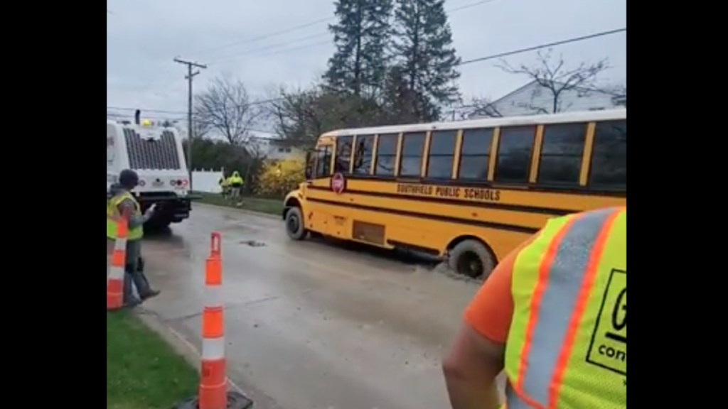 Watch A School Bus Drive Right Through Wet Concrete With Kids On Board