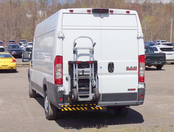 Back of white van in a parking lot