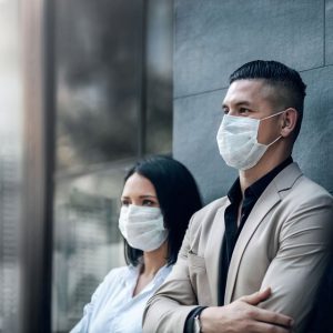 Business people wearing masks