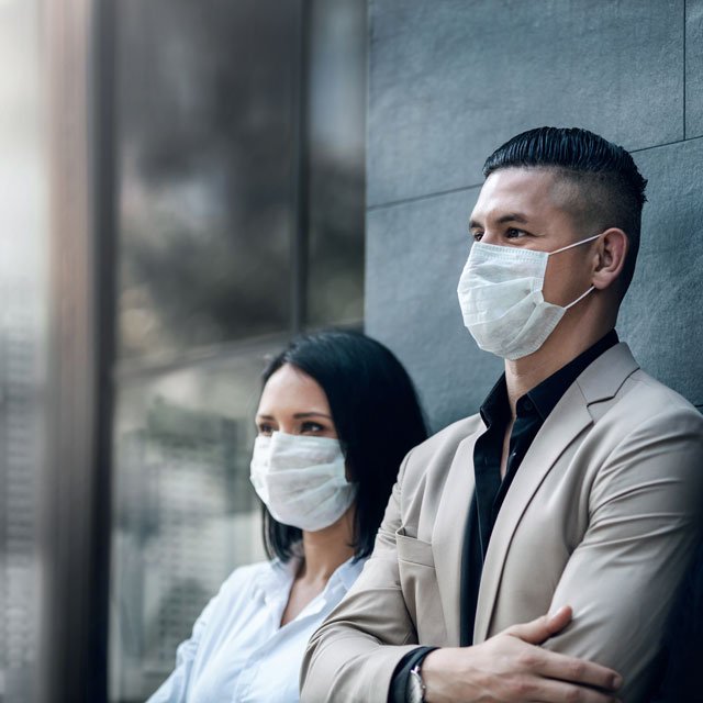 Business people wearing masks