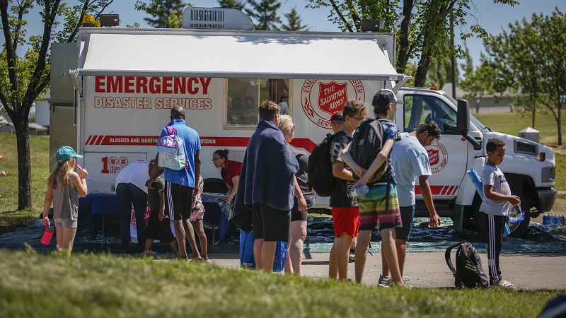 An EMS vehicle is set up as a cooling station during a June 2021 heat wave in Calgary