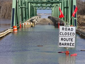 Road closed sign after flooding in Manitoba