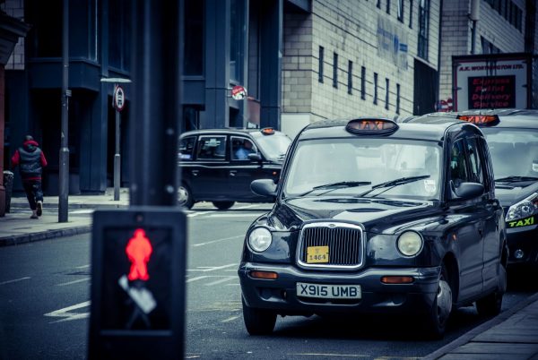 Black cab waiting at the traffic light