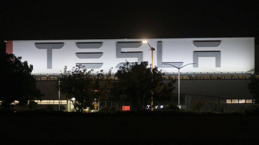 Tesla sued by former employees over 'mass layoff'