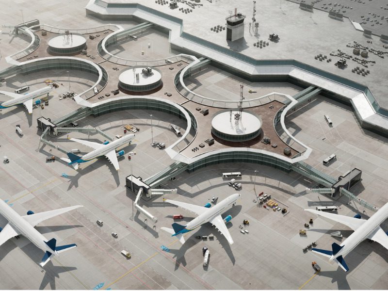 Bird's eye view of airport terminal with parked airplanes