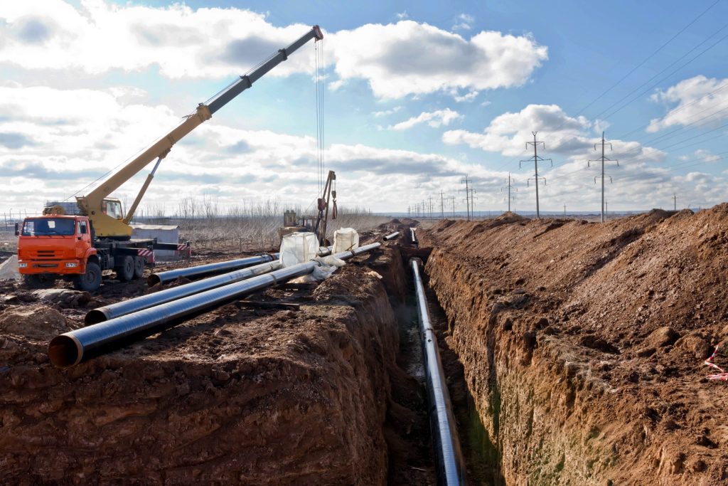 Excavating, Trenching and Leveling a Drilling Site