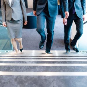 Executives walking up stairs