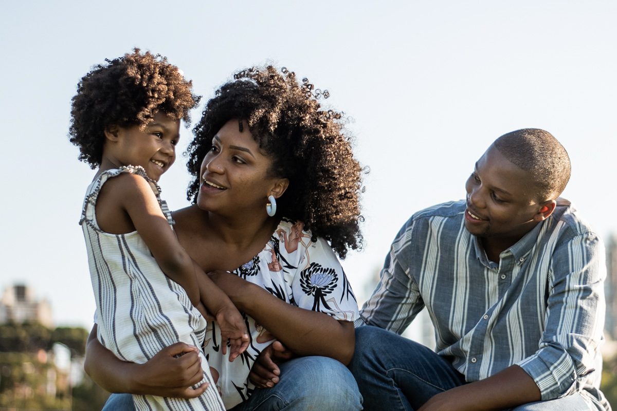 A family enjoys a clear day in a park