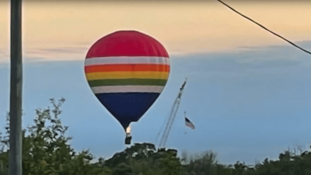 Hot Air Balloon Crashes into Moving Train, Injuring Pilot and Two Passengers