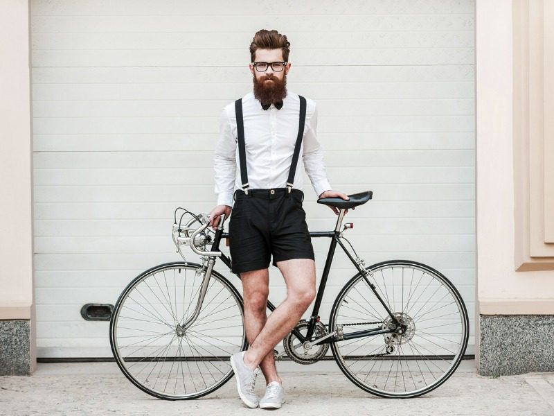 Hipster on a bicycle representing the Millennial generation