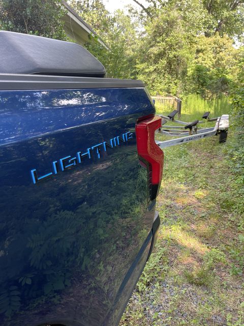 ford lightning with boat trailer