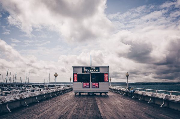 Ice cream trailer parked on Devon pier