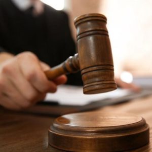 Shutterstock image of a judge holding a gavel in a court room