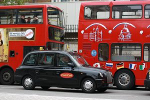 Middle Age Taxi Driver in a Black Cab