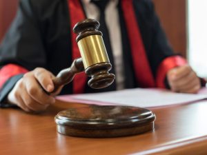 Judge banging gavel in a courtroom