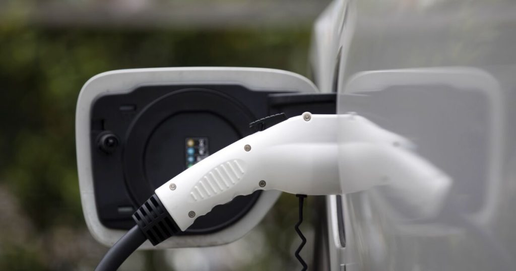 Automakers blitz Congress to fix an EV tax credit they can't use