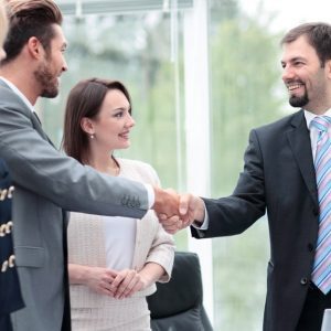 Advisors shaking hands