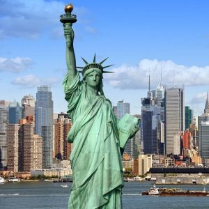 The Statue of Liberty, against the backdrop of New York City.