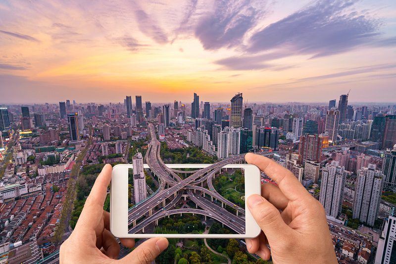 Shanghai Skyline Sunset. Bridges winding through a mobile screen