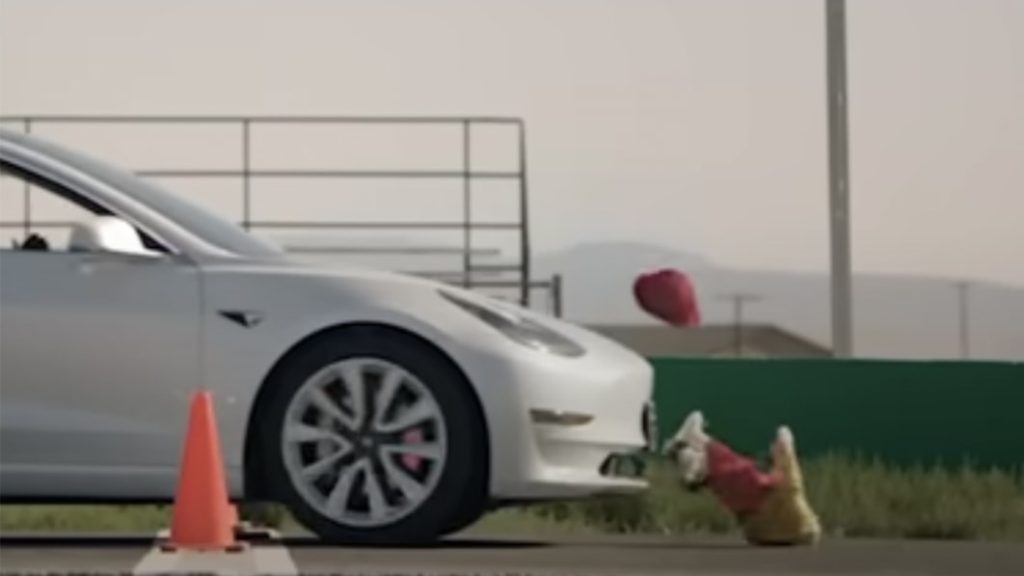 Tesla wants videos of its cars running over child dummies removed