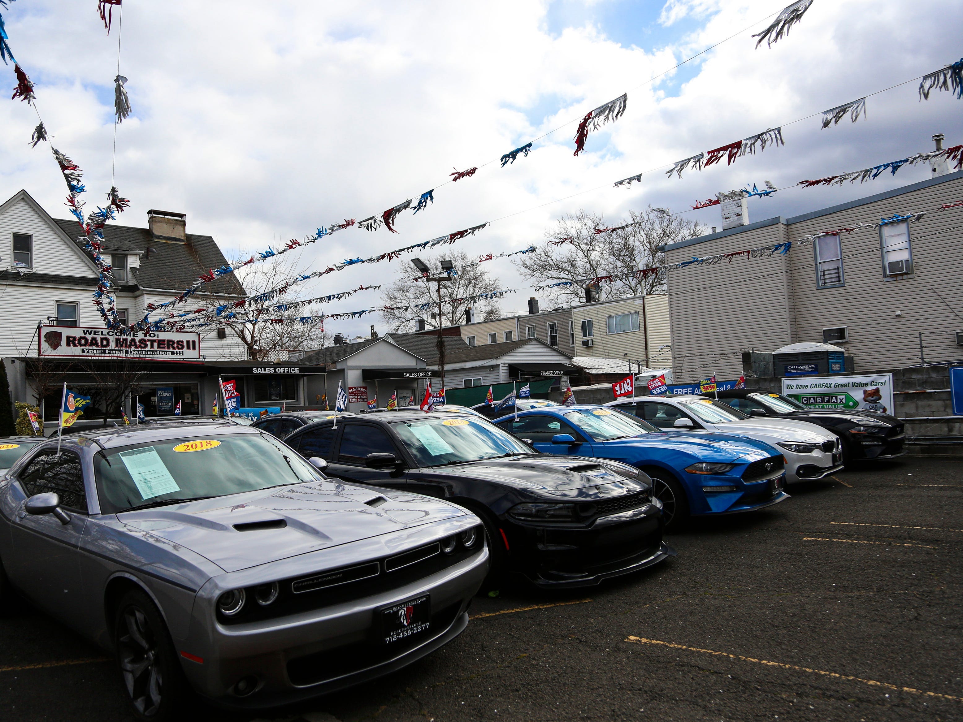 Used car lot with muscle cars