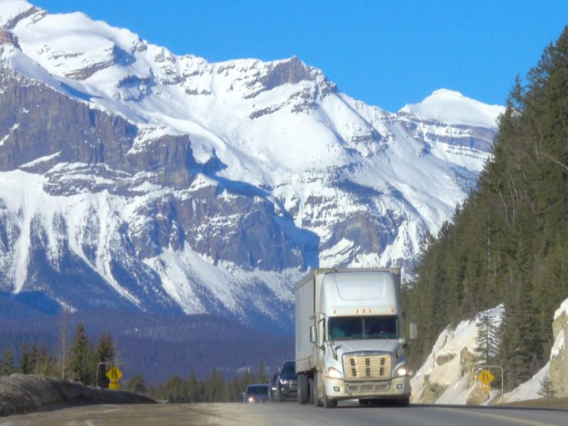 Large truck on the Icefields Parkway in Alberta, Canada