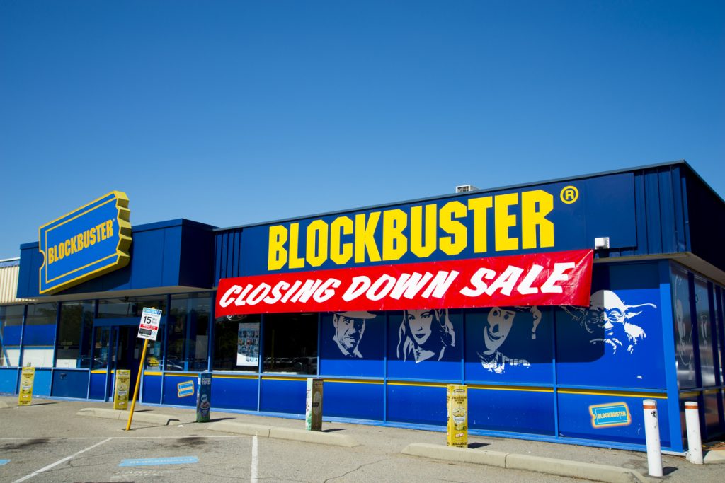 A zblockbuster in Australia with a red sign across the front door that says "closing down sale."