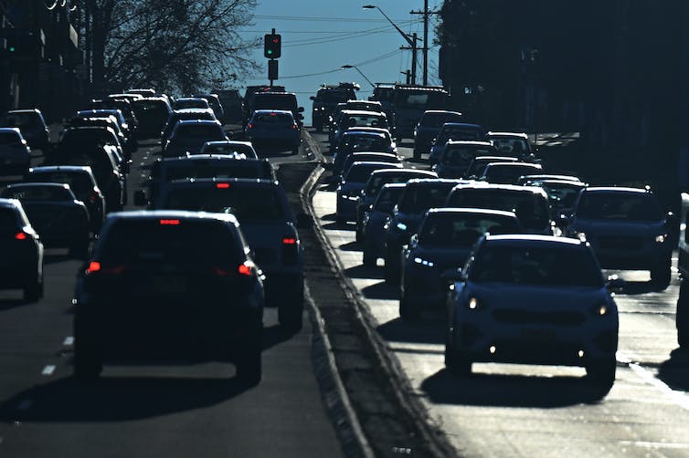 cars queue on road