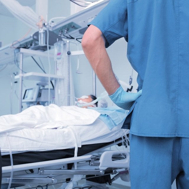 Adobe Stock image of doctor watching patient in hospital