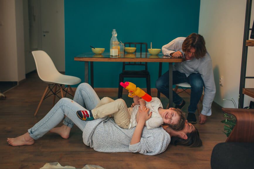 Young couple moving in to their new home. Mortgage concept