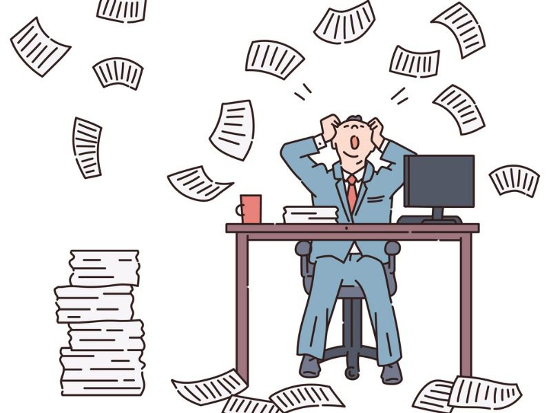 Business owner in a paperwork avalanche