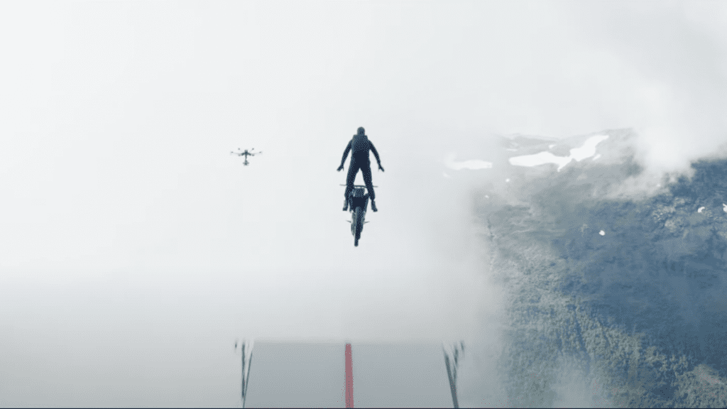 Watch Tom Cruise Jump a Motorcycle Off a Cliff in the New Mission: Impossible