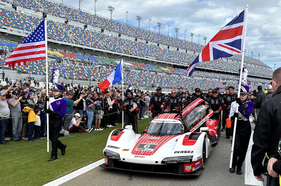 a porsche 963 on the grid before the start of the race