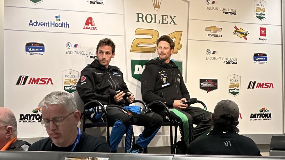 filipe albuquerque and romain grosjean at a media briefing