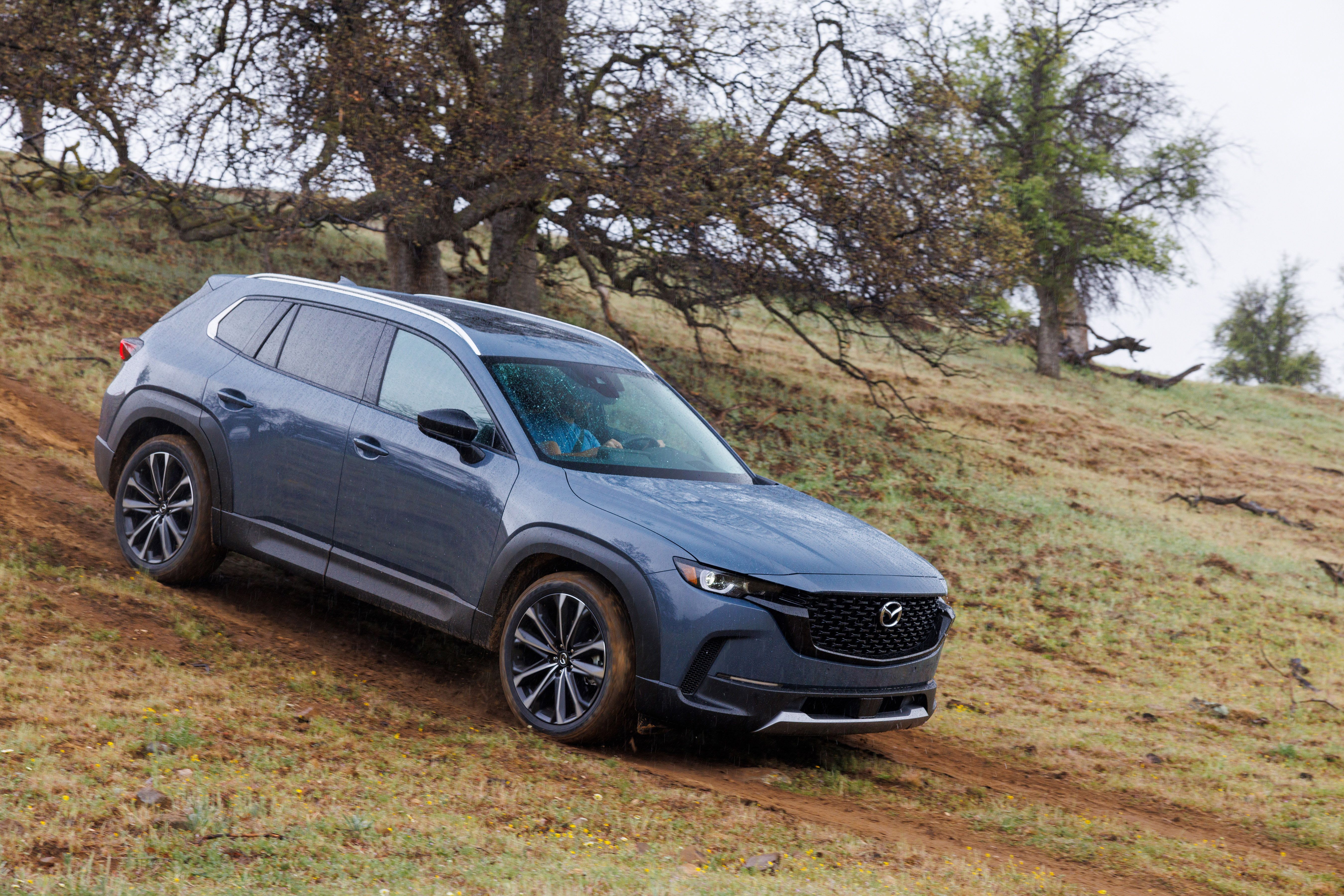 2023 mazda cx50 gray off road downhill