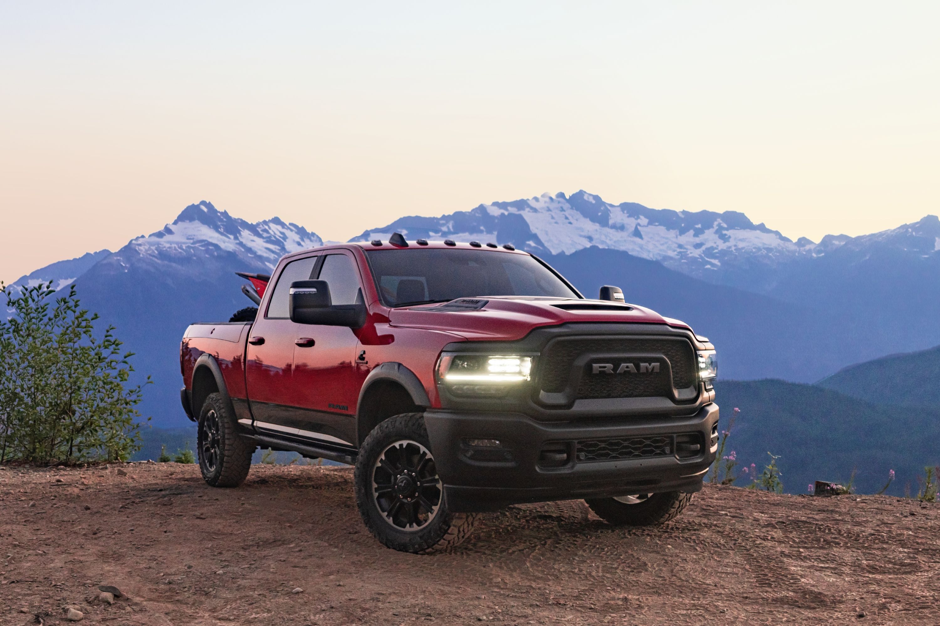 2023 ram 2500 hd rebel with a mountain in the background