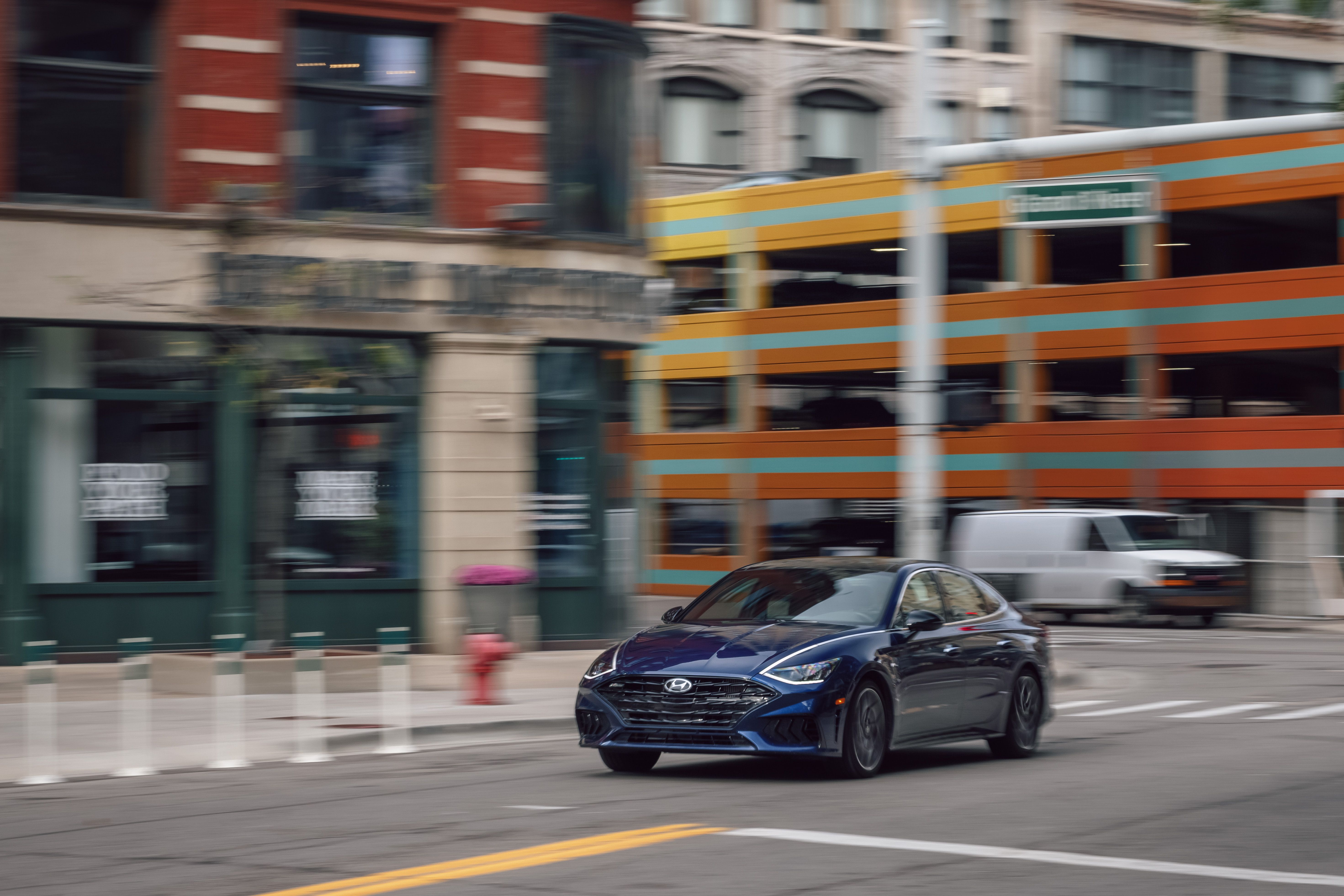 2023 hyundai sonata n line rounding a downtown city corner