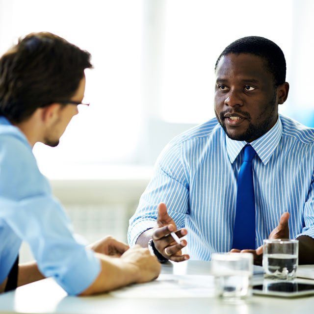 Two businessmen talking