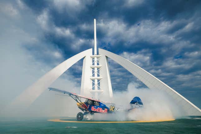 Image for article titled Stunt Pilot Lands on the World&#39;s Shortest Runway, a Helipad