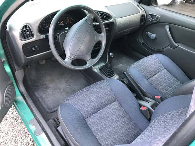 Image for article titled At $4,500, Is This 1995 Geo Metro a Mileage-Making Marvel?