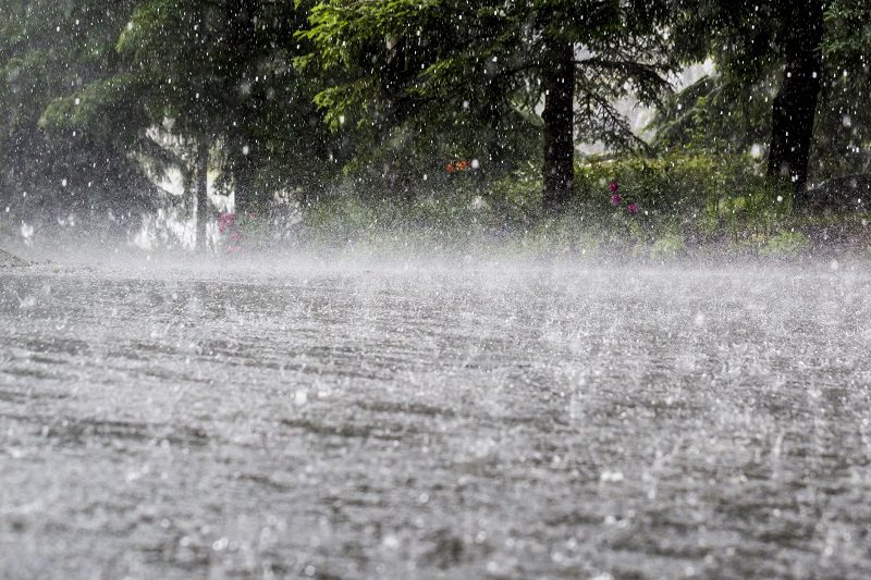 Torrential rain causing flood.