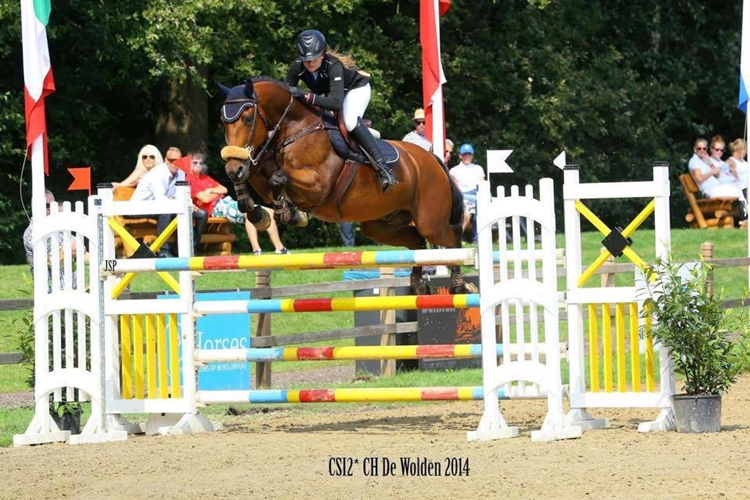 Lidija show jumping on her horse