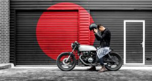 young man sitting on a motorbike