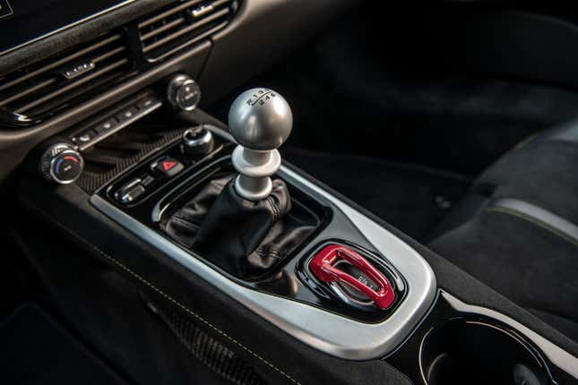 The shifter and center console of the 2023 Lotus Emira.